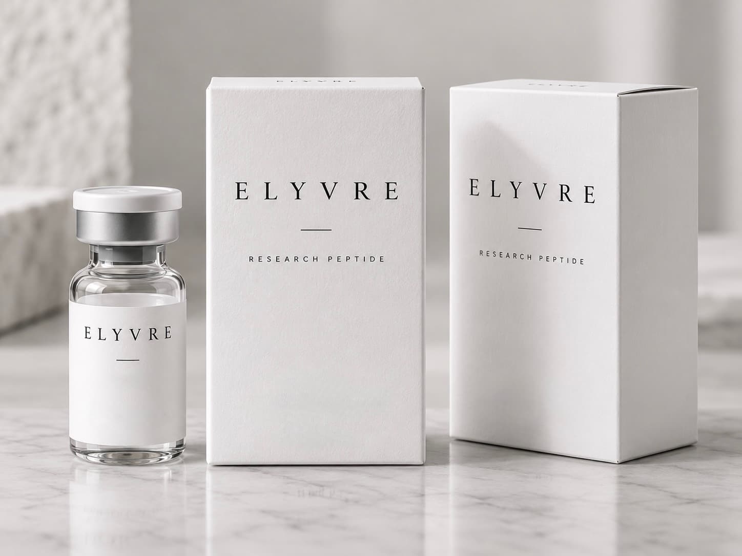 Elyvre Umverpackung und Vial auf Marmor